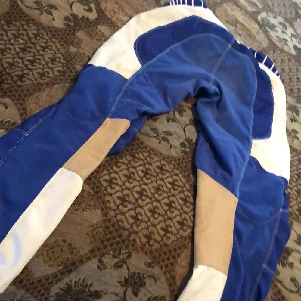 Fox Racing 180 size 30 motorcycle pants one tear